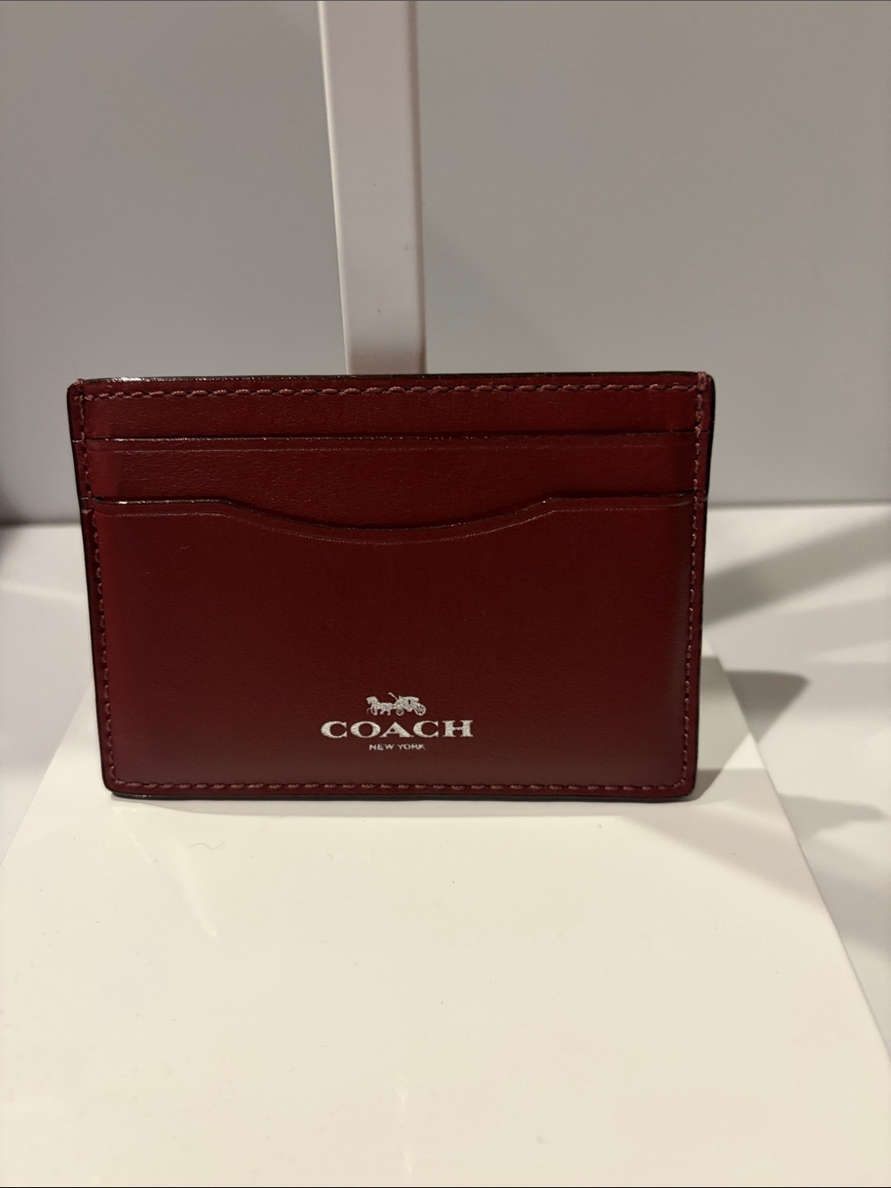 Coach Burgundy Leather Card Case with red lips